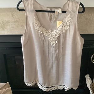 Beautiful sleeveless top with lace detailing